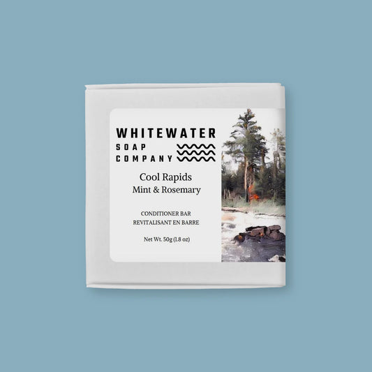 Whitewater Soap Company conditioner bar packaging with a scenic design on a light blue background