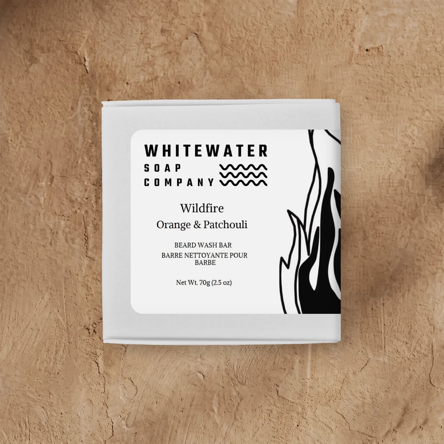 Whitewater Soap Company Wildfire Orange & Patchouli beard wash packaging on a beige background