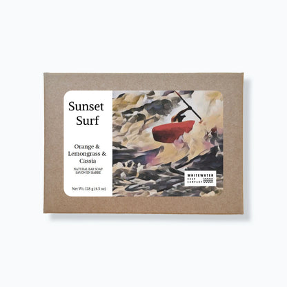 Bar of soap packaging with 'Sunset Surf' branding on a white background