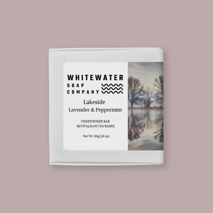 Whitewater Soap Company conditioner bar packaging on a pink background