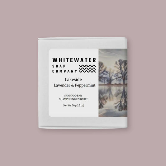 Whitewater Soap Company shampoo bar packaging on a light purple background