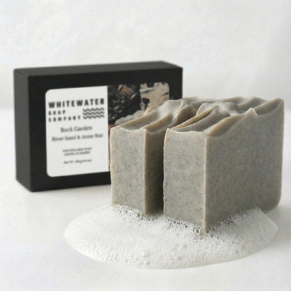 Bar of soap with a black box labeled 'Whitewater Soap Company' on a white background