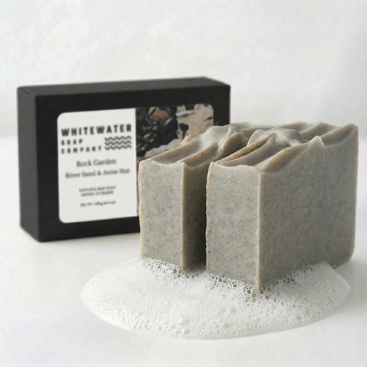 Bar of soap with a black box labeled 'Whitewater Soap Company' on a white background