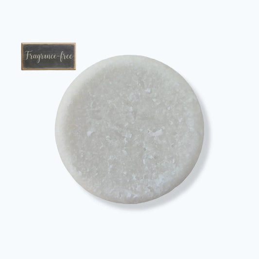 Round gray stone with 'Fragrance-free' label on a white background