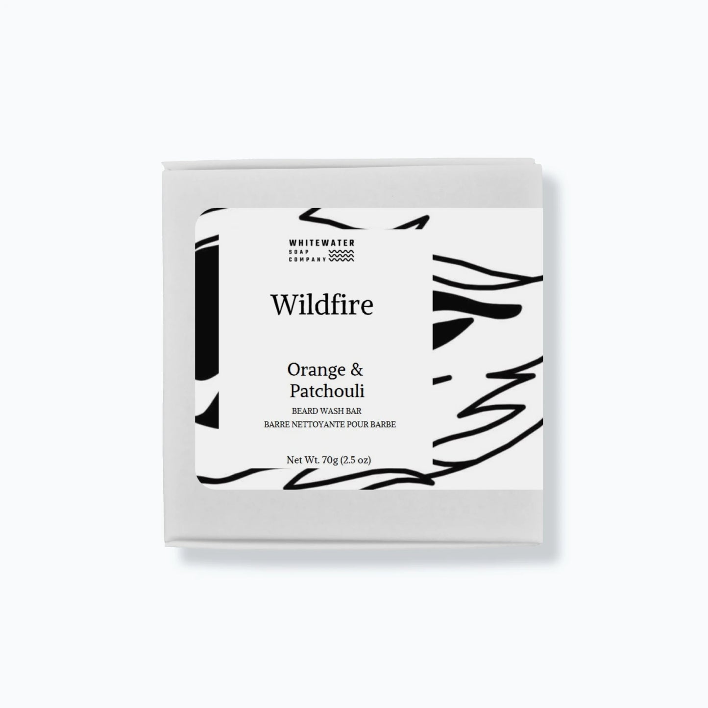 Beard wash bar packaging with 'Wildfire' and 'Orange & Patchouli' text on a white background