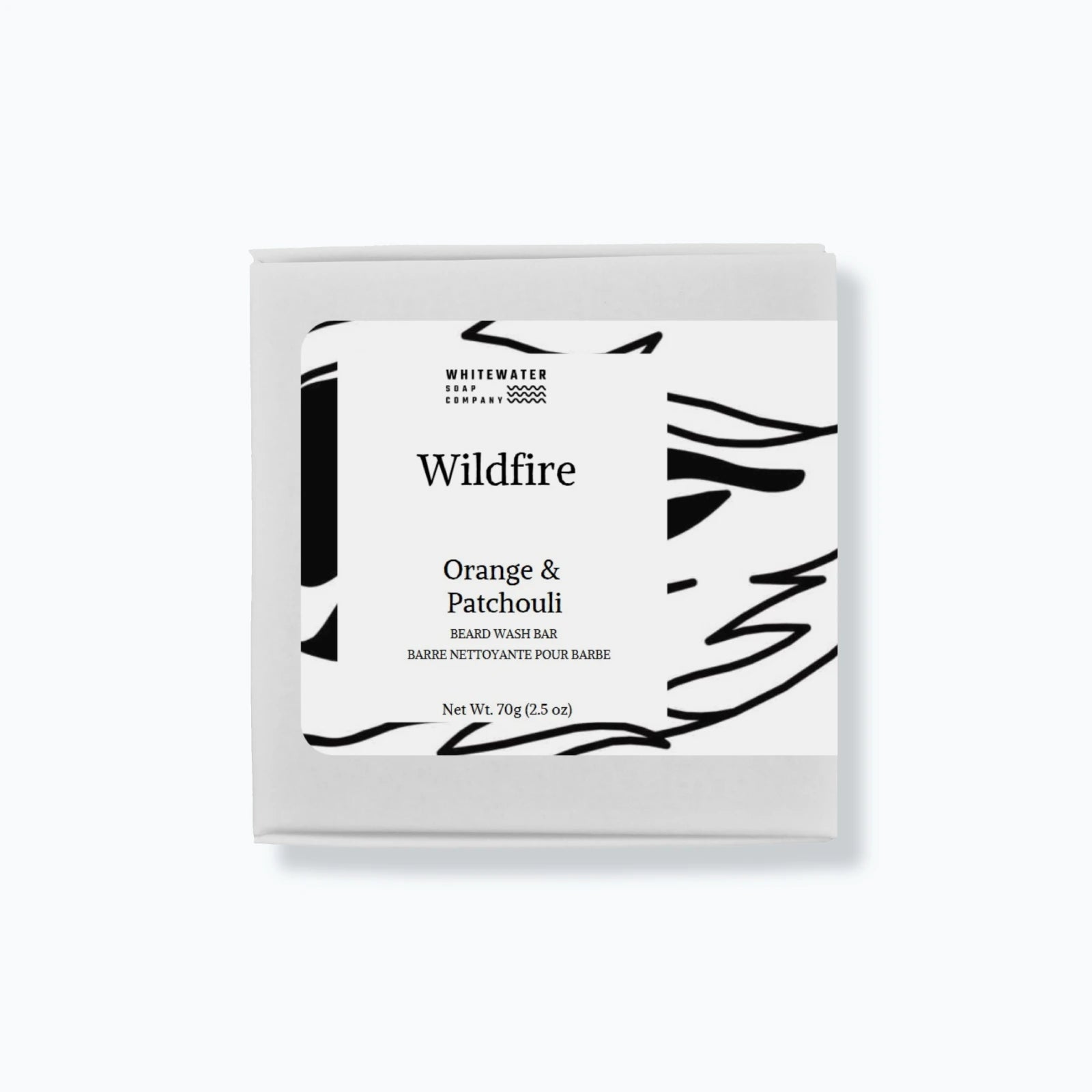 Beard wash bar packaging with 'Wildfire' and 'Orange & Patchouli' text on a white background