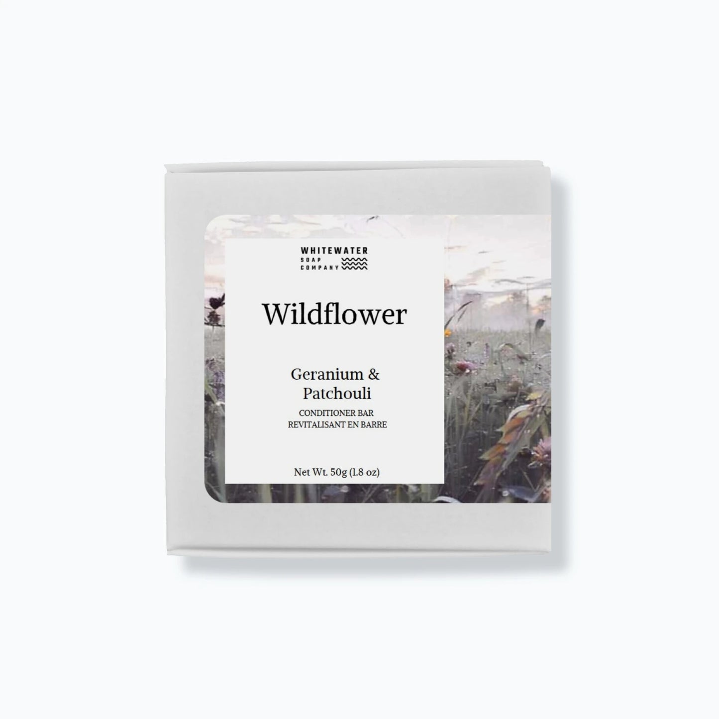 Whitewater soap solid hair conditioner packaging with nature-themed design on a white background