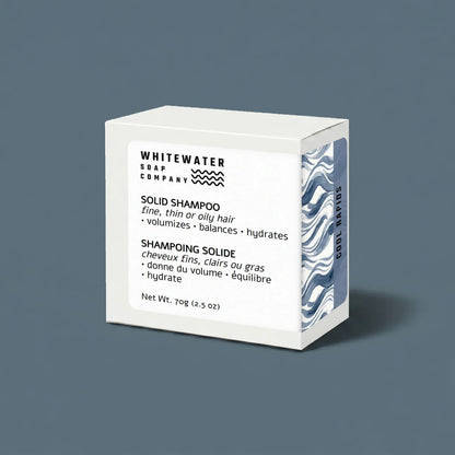 Whitewater Soap Company solid shampoo bar packaging on a gray background